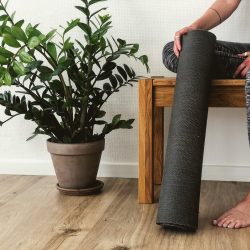person sitting on gray chair